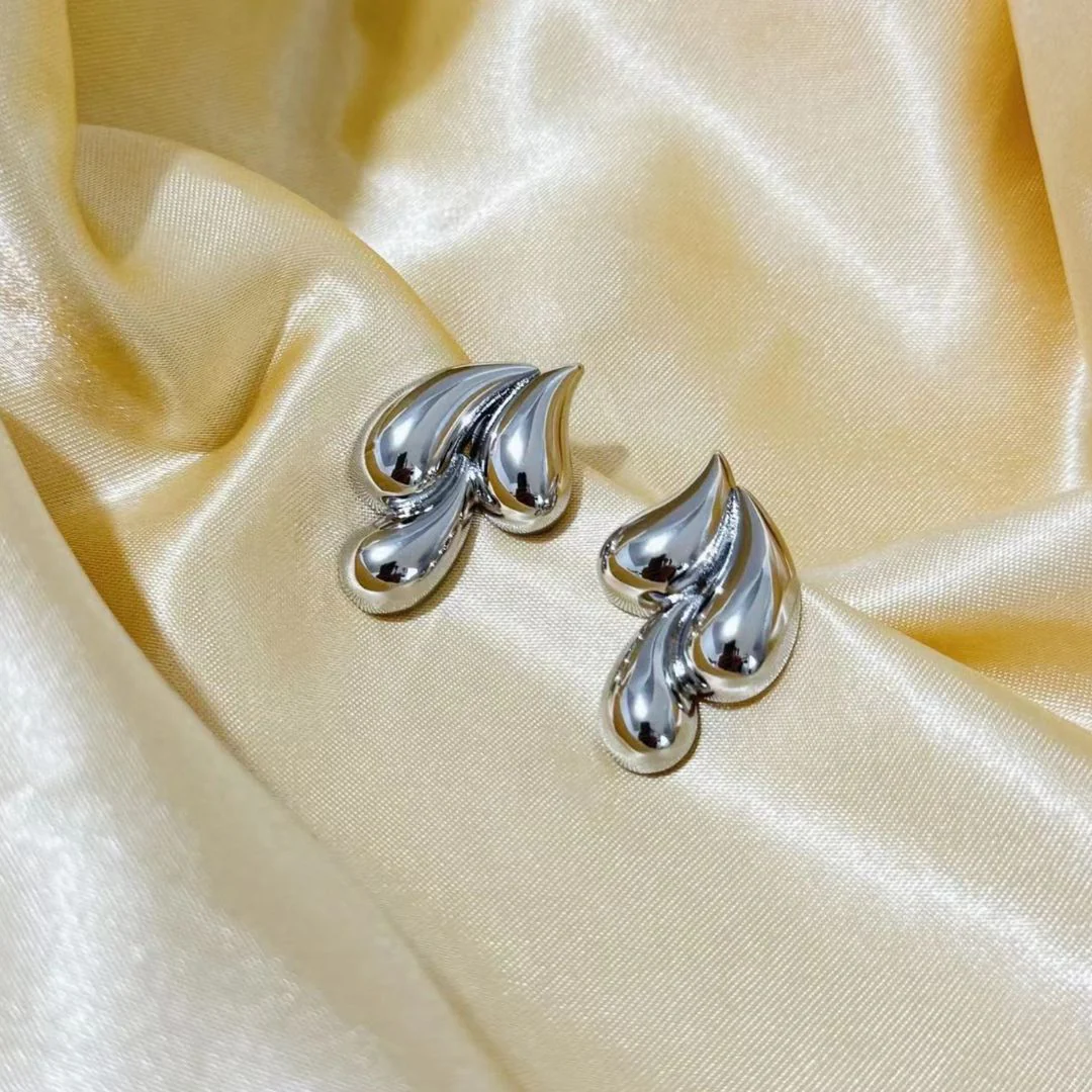 Liquid Drop Stud Earrings – Bold Water-Inspired Statement Jewelry - Image 4